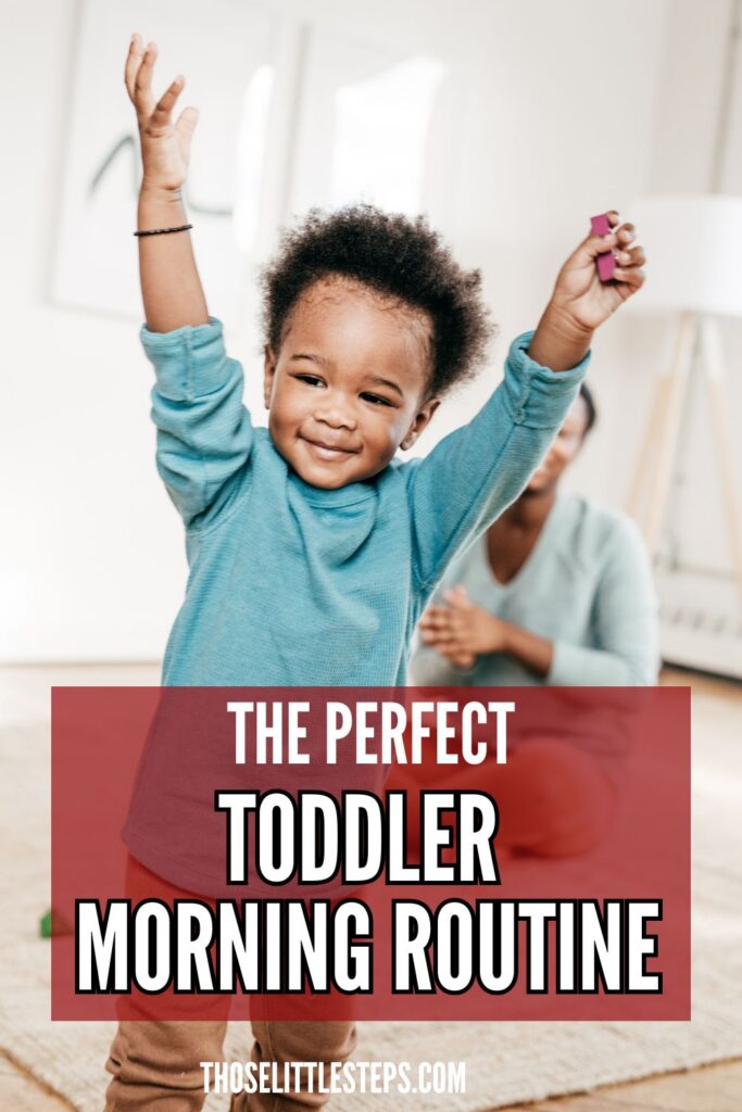 Toddler raising their arms while playing indoors with a parent nearby, with text overlay reading "The Perfect Toddler Morning Routine."